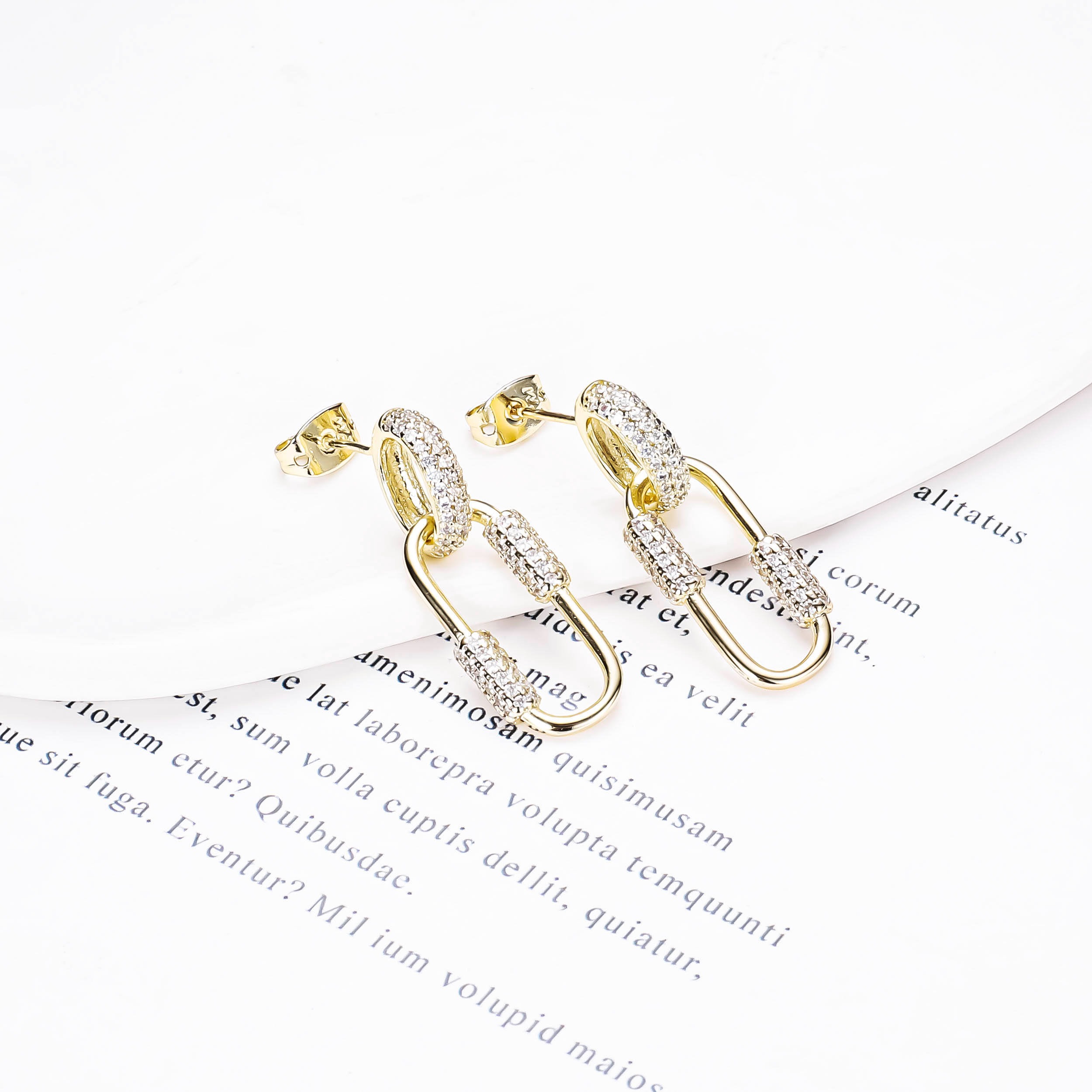 H241ee776fdae422b9a612d76a1788b1 Zircon Oval Hoop 14K Gold Earrings - Image 1