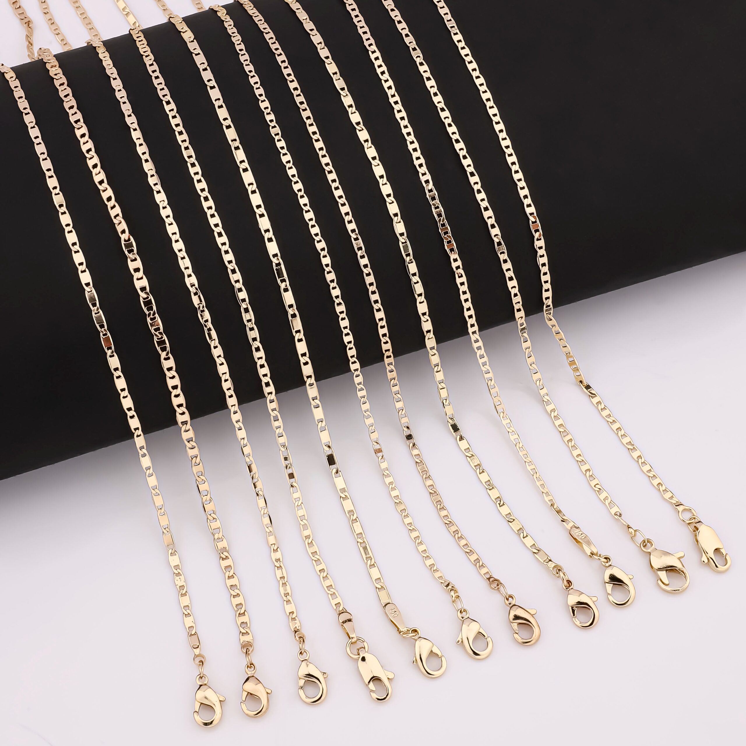 H29cc9fa837e04a238b340facf08e54e 14K Oro Laminado Figaro Chain Necklace - Image 1