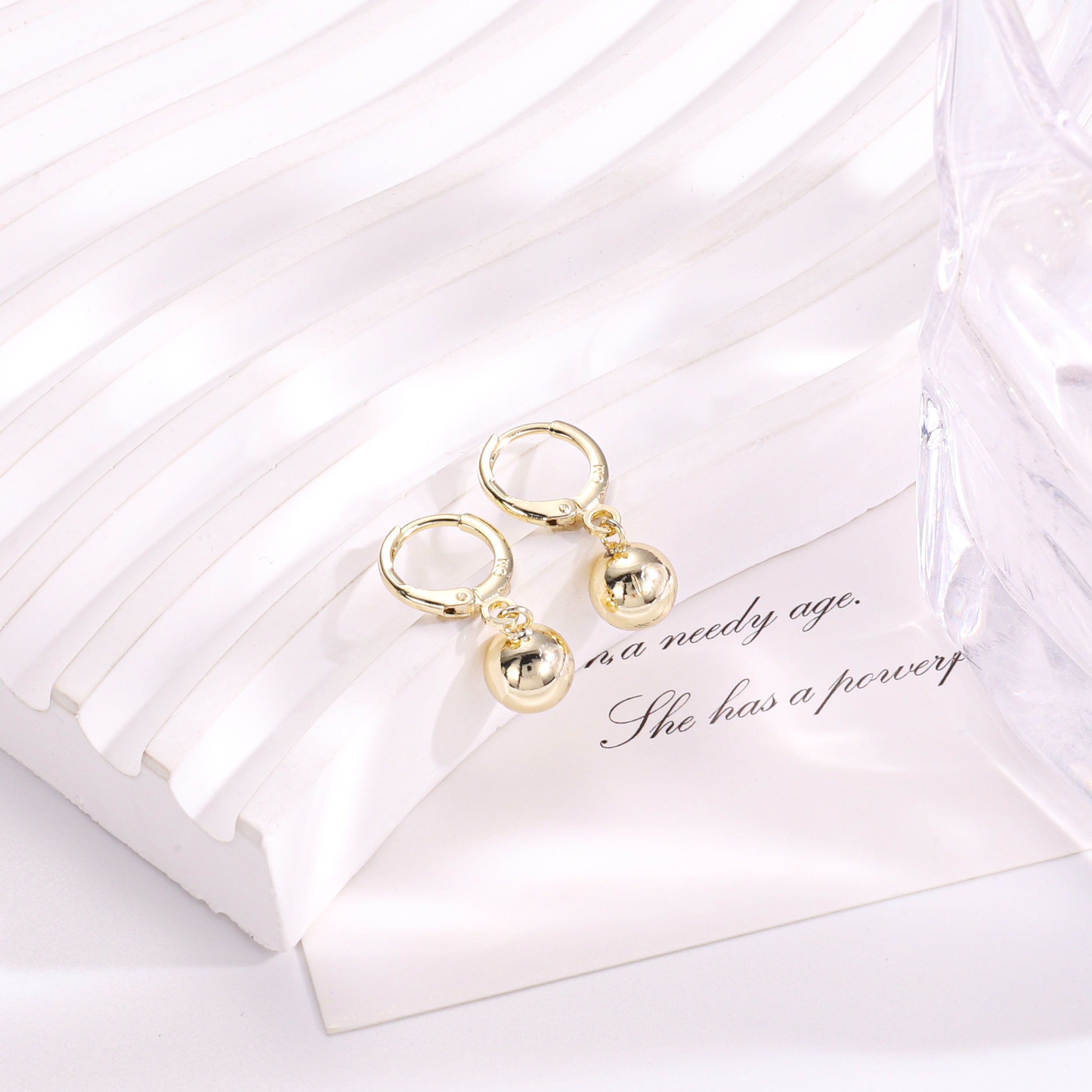 Haa0c1bdff4204eab97b3fd348efb4d5 14k Gold Plated Minimalist Ball Drop Hoop Earrings for Women - Image 1