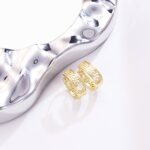 14K Gold Oval Huggie Earrings – Trendy Medium Hoop - Image 2